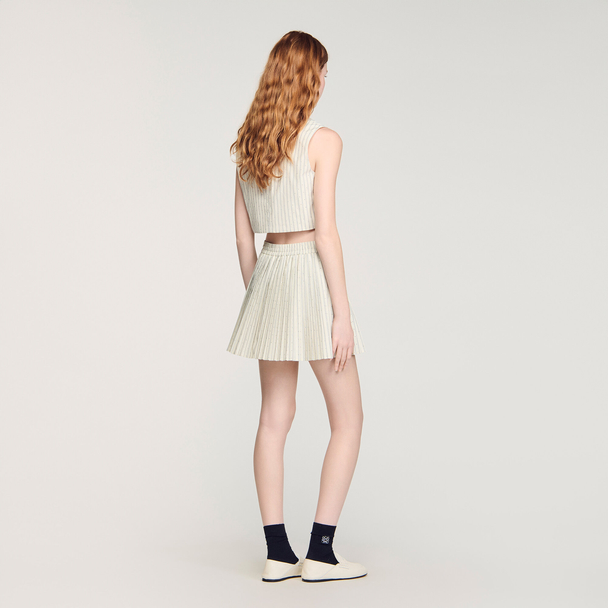 Kurzer Rock mit Streifen und Strass