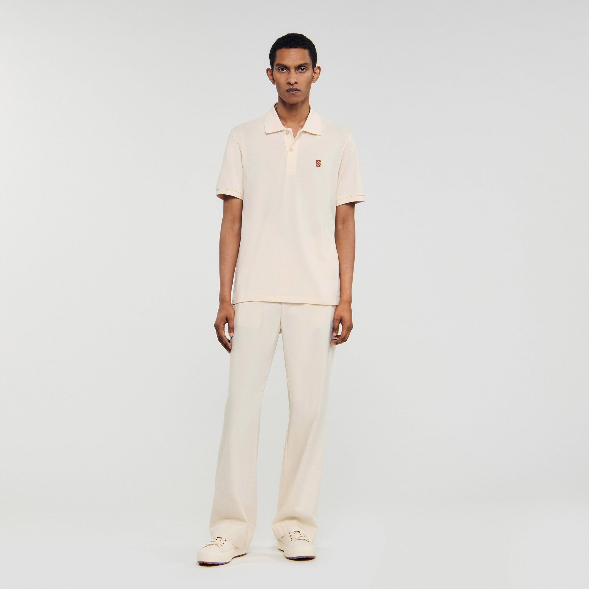 Poloshirt mit Leder-Logo