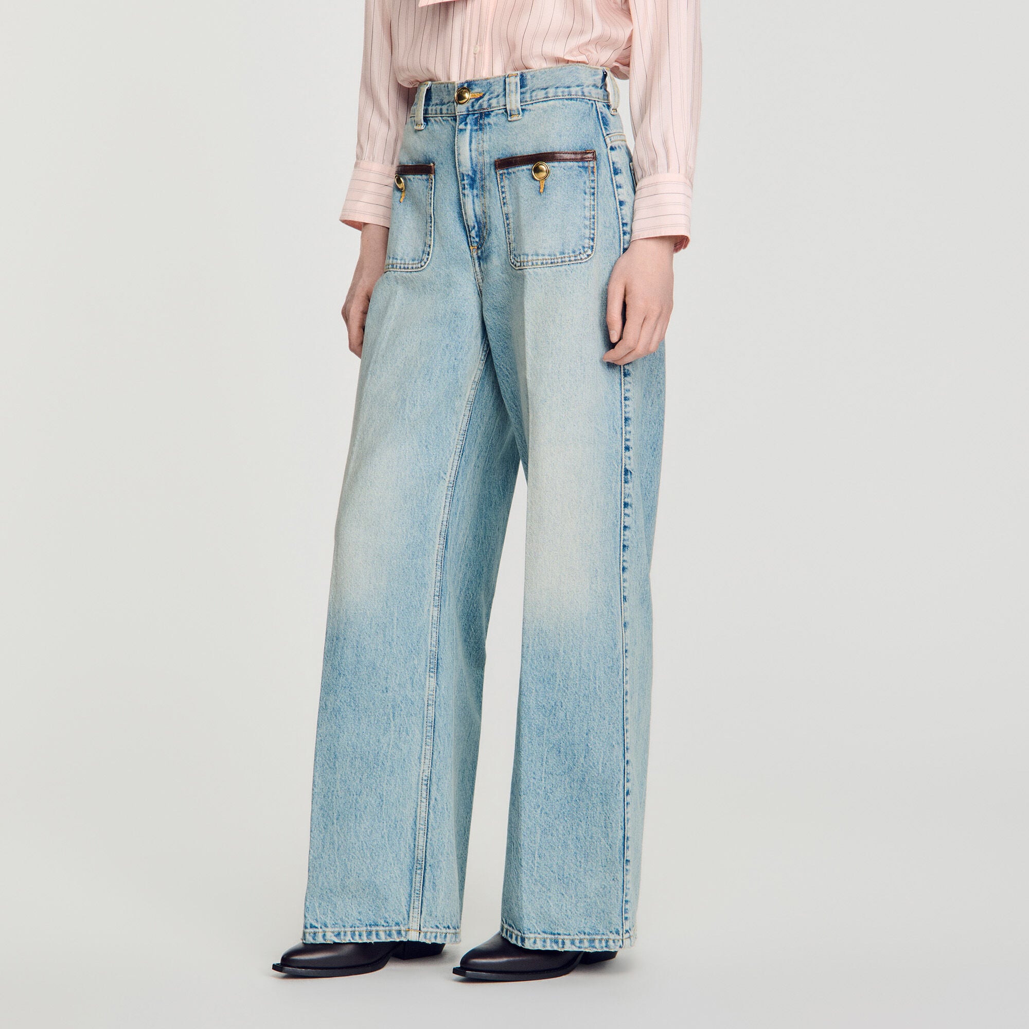 Gerade Jeans mit Lederdetails