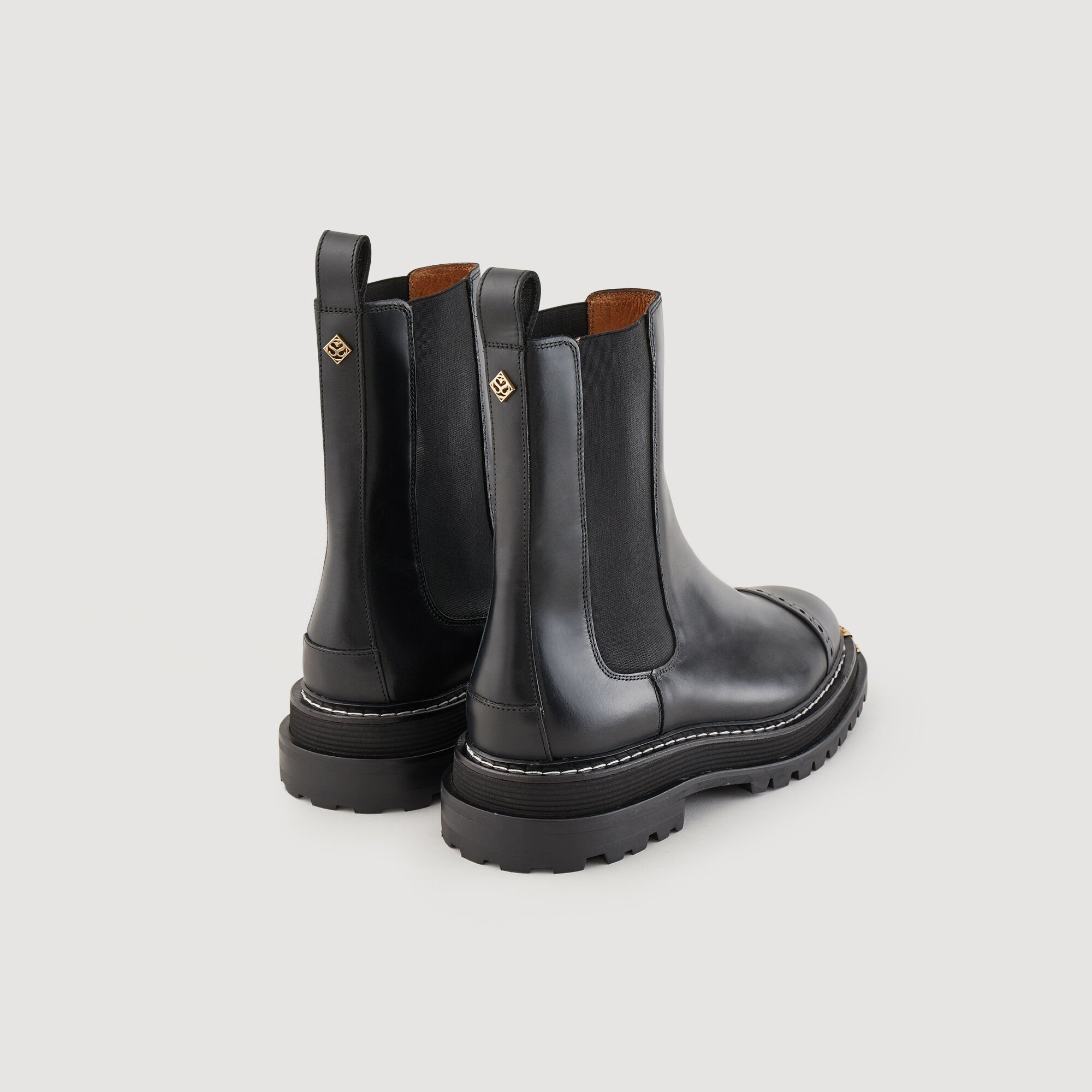 Stiefeletten mit gezackter Sohle
