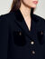 Kurze Jacke aus Tweed und Velours
