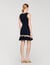 Kurzes Strickkleid mit Metallkette