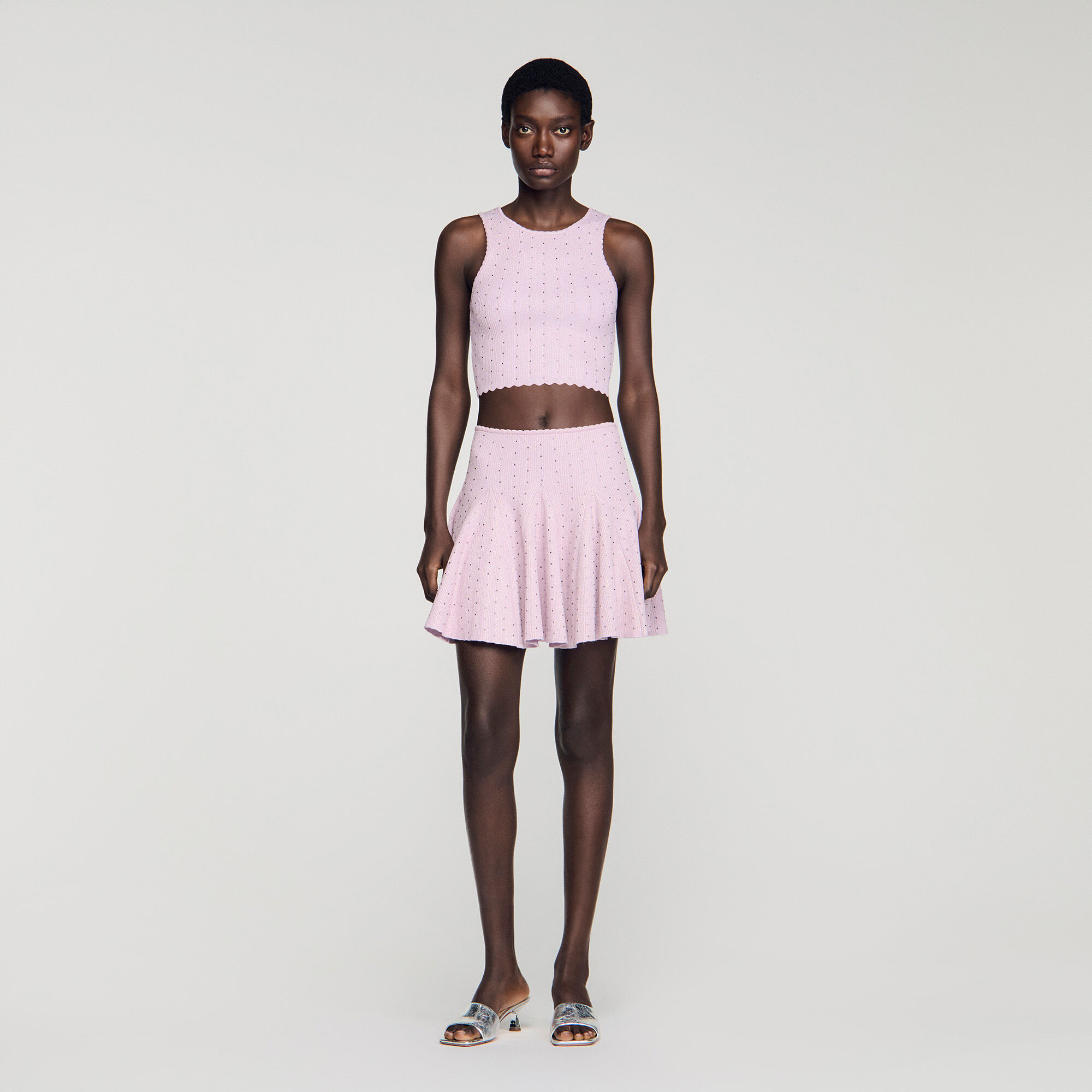 Kurzer Strickrock mit Strassbesatz