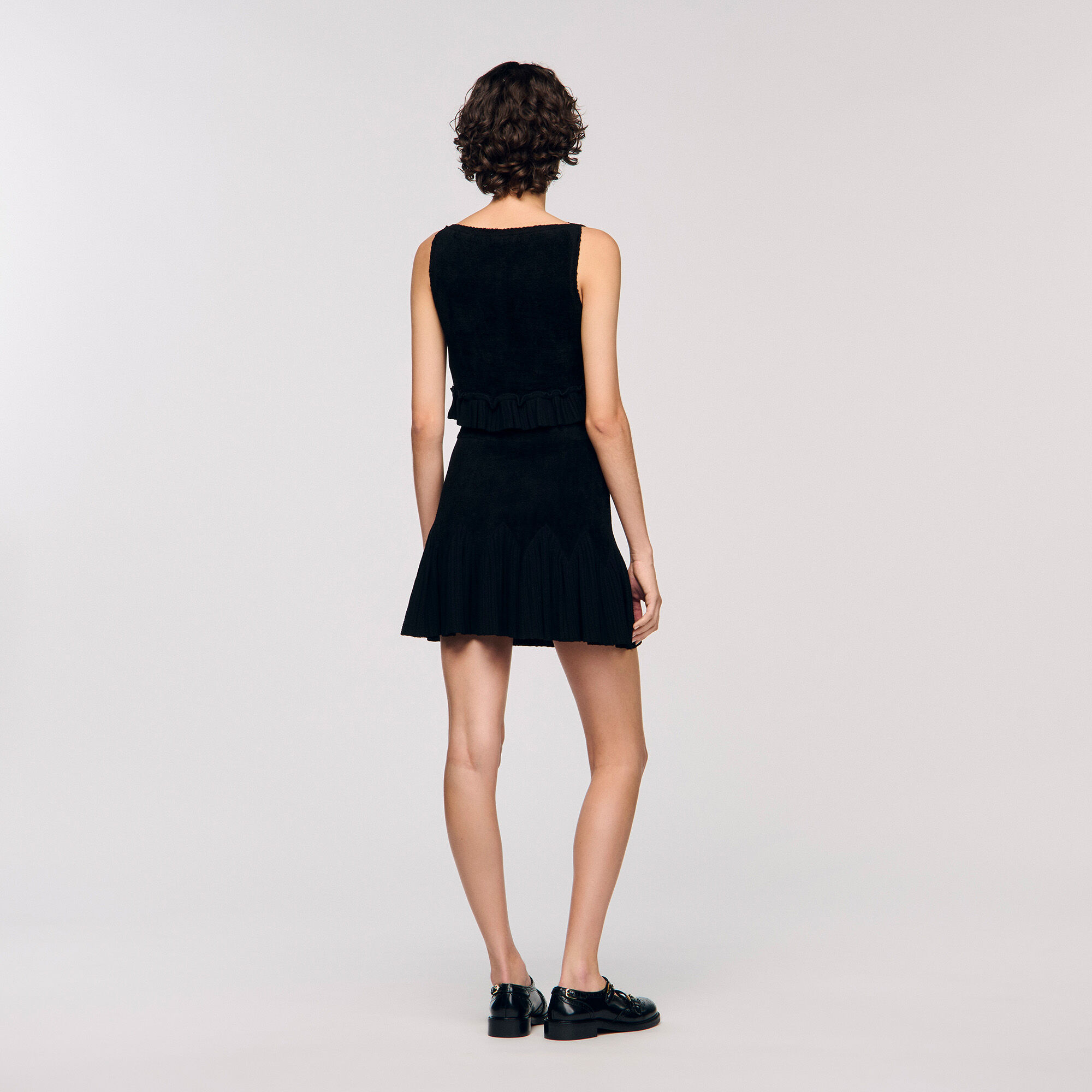 Kurzes Stricktop mit Volant