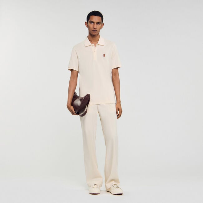 Poloshirt mit Leder-Logo