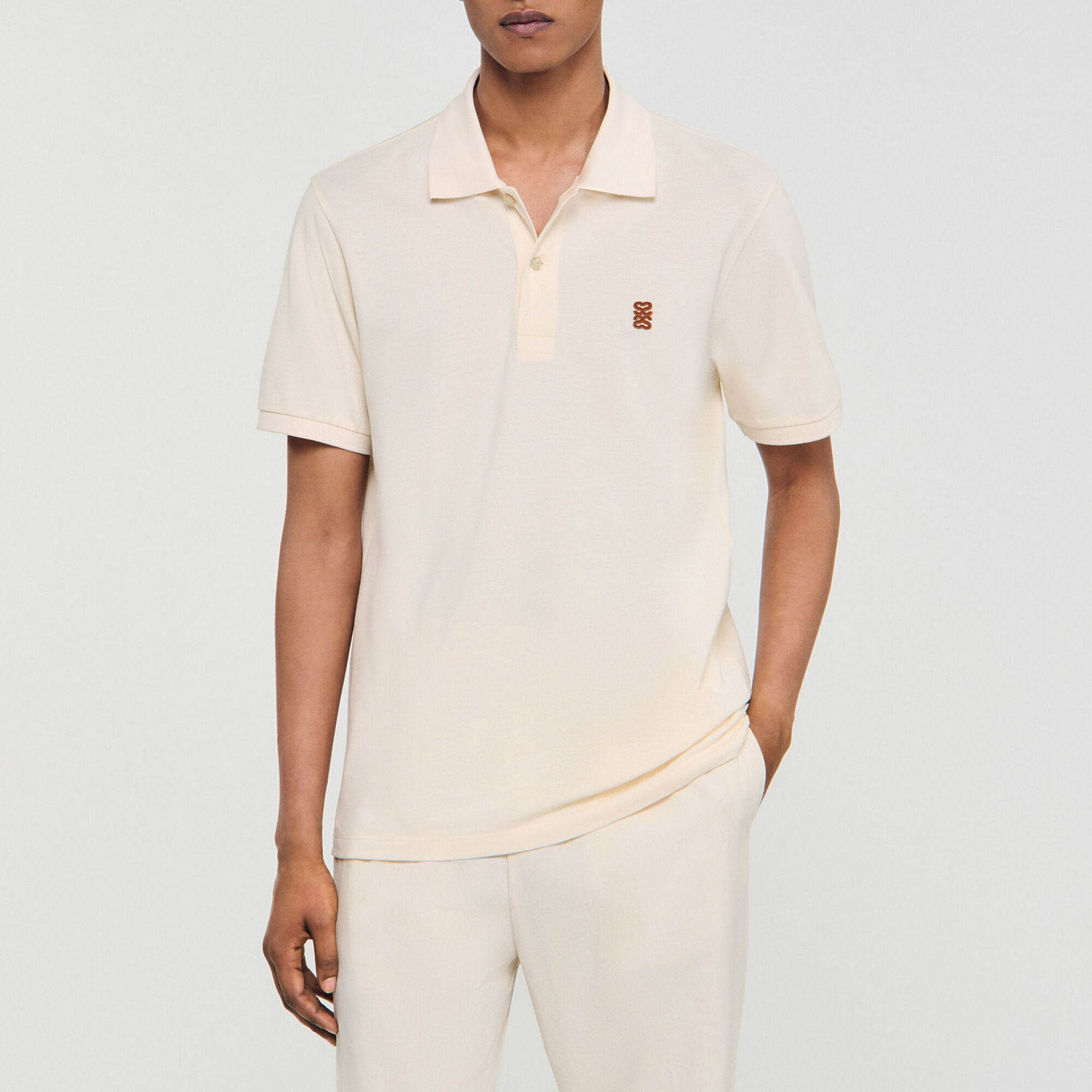 Poloshirt mit Leder-Logo - Herren | Sandro