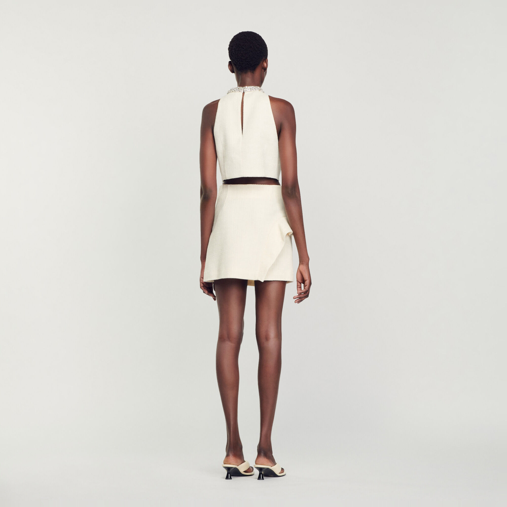 Kurzer Rock mit Volant