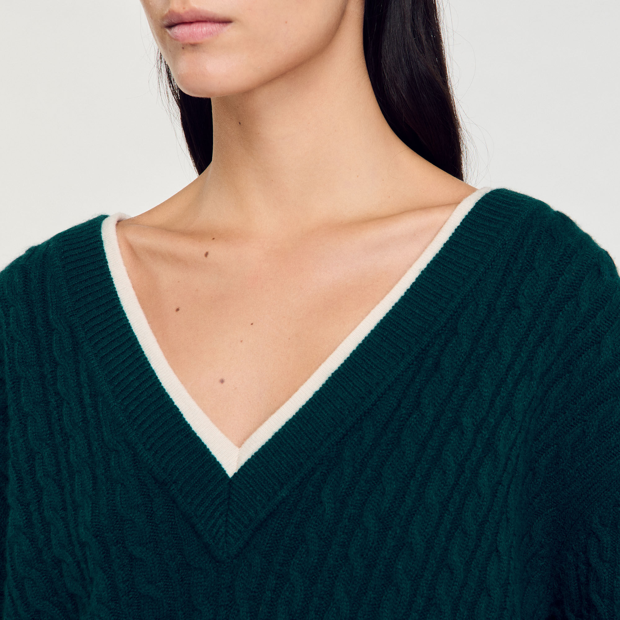Trompe-l'Œil-Pullover aus Strick
